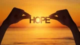Silhouette, Hand holding a hope text and sunset.