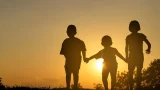 Happy,Children,Jumping,On,Sunset,Background
